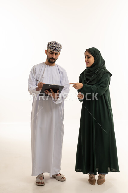 Omani Professionals with Clipboard on White Background