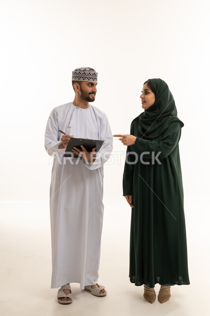 Omani Professionals with Clipboard on White Background