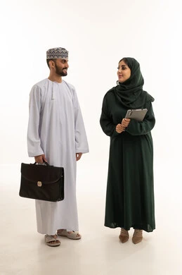 Omani Business Colleagues in Traditional Attire