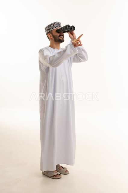 Omani Man Using Binoculars on White Background