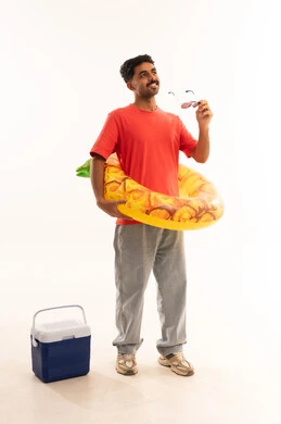 Saudi Man with Summer Vacation Gear in Studio