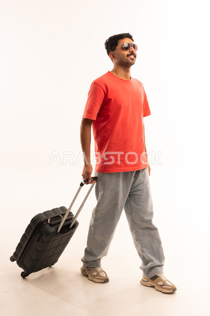 Saudi Man Walking with Suitcase on White Background