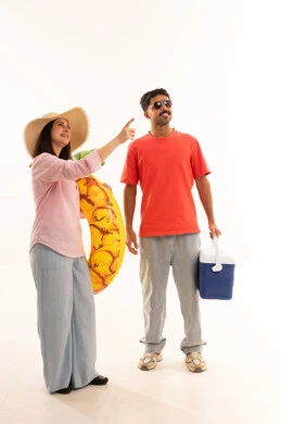 Saudi Couple Preparing for Summer Vacation in Studio