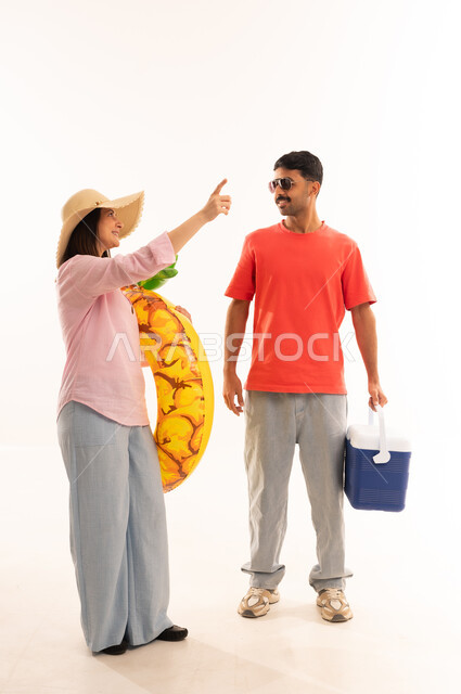 Arab Couple with Beach Accessories in Studio