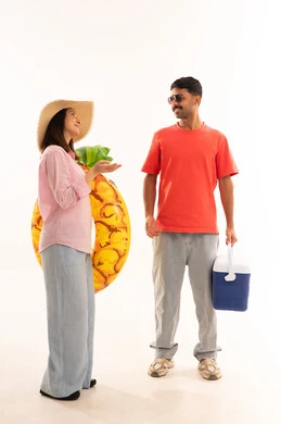Arab Couple with Summer Vacation Gear on White Background