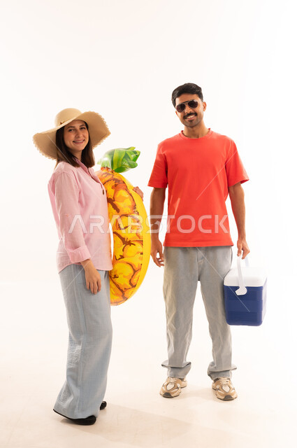 Arab Couple with Beach Accessories on White Background