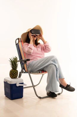 Woman in VR Headset on Beach Chair in Studio