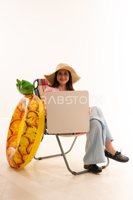 Arab Woman with Beach Chair and Blank White Board