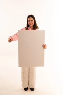 Young Woman Holding Blank Poster on White Background