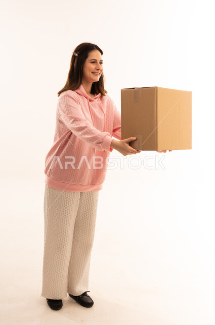 Arab Woman Holding Delivery Cardboard Box on White Background
