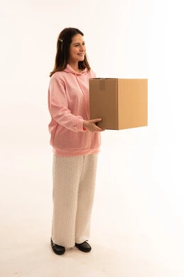 Arab Woman Holding Cardboard Box on White Background