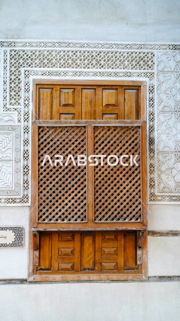 Traditional Wooden Mashrabiya Window on Patterned Wall