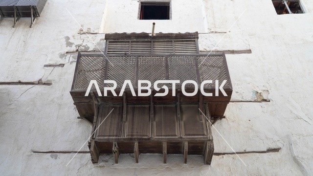 Traditional Hijazi Rawshan Balcony on Old White Building