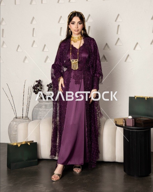 Saudi Arab Woman in Modern Purple Abaya and Gold Jewelry