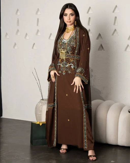 Saudi Woman in Traditional Embroidered Brown Abaya