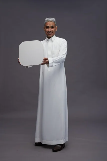 Saudi Man Holding Blank White Board Studio Portrait
