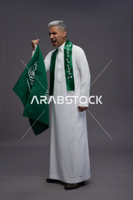 Saudi Man Holding Flag Shouting in Studio