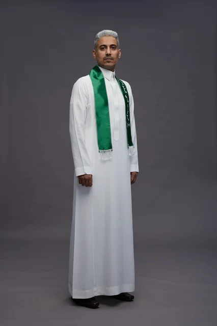 Saudi Man in White Thobe and Green National Scarf
