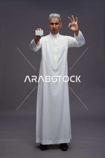 Saudi Man in Thobe Holding Blank Card