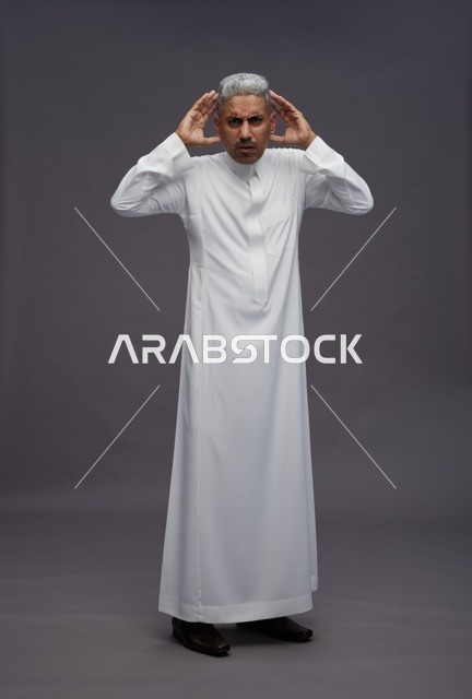 Saudi Man in White Thobe with Confused Expression