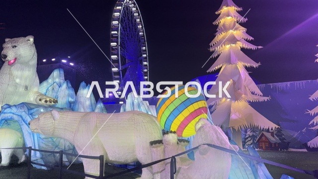 Illuminated polar bear statues and entertainment activities at Winter Wonderland, Global Street in Jeddah at night.