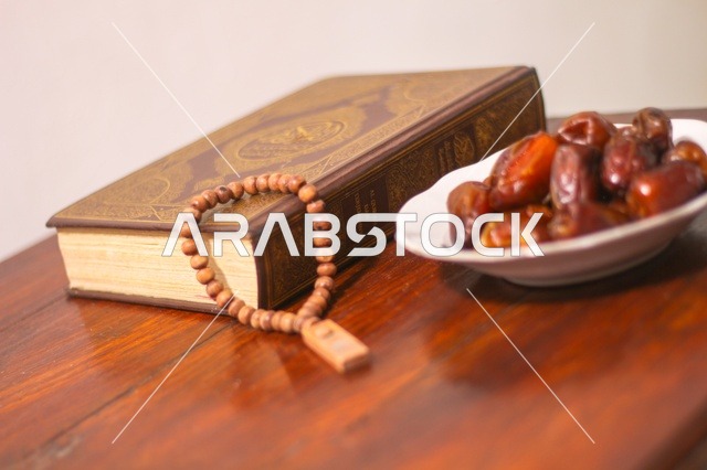 Holy Quran with Prayer Beads and Dates
