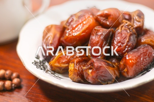 Fresh Brown Dates on White Plate during Ramadan Iftar