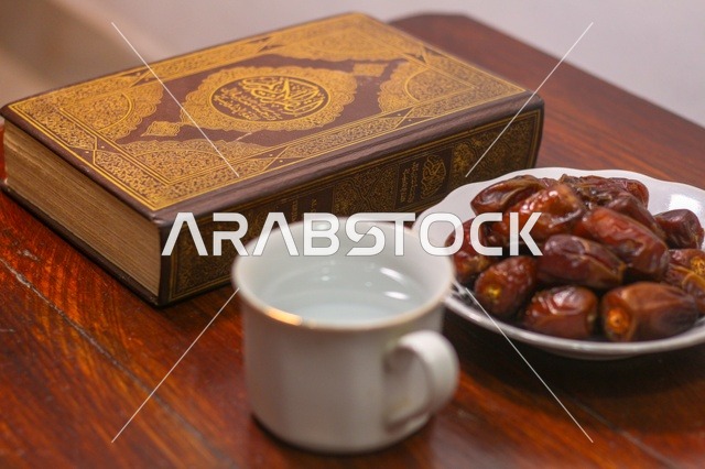 Holy Quran with Dates and Water for Ramadan Iftar