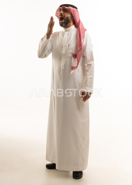 Saudi Man in Traditional Clothing Yawning on White