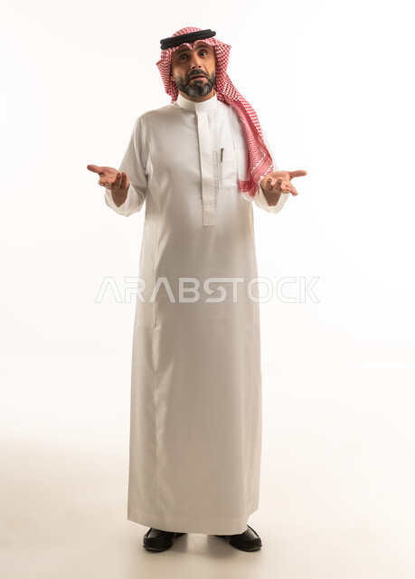 Saudi Man in Traditional Dress Gesturing Confusion