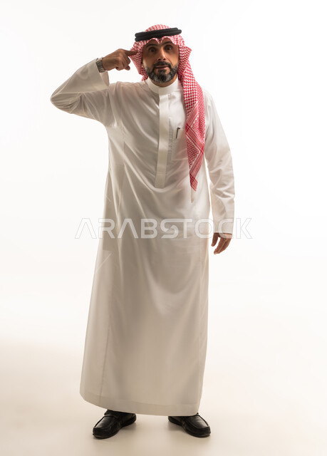 Saudi Man in Traditional Thobe Thinking Gesture