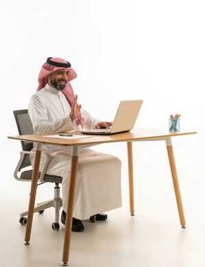 Saudi Businessman Waving at Laptop in Office Studio