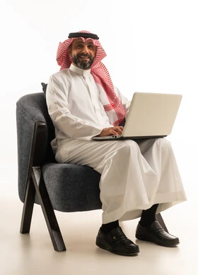Saudi Businessman with Laptop on White Background