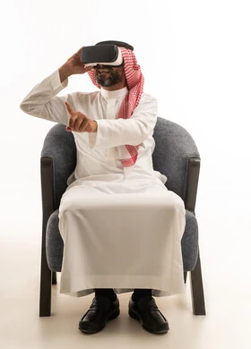 Saudi Man Wearing VR Headset in White Studio