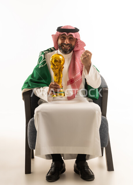 Saudi Man Holding Gold Trophy with National Flag