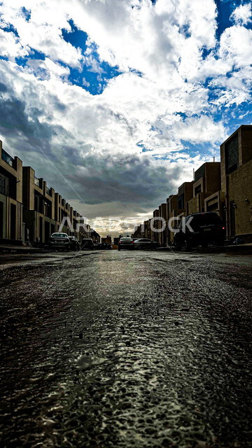 صورة إبداعية لحي العارض في مدينة الرياض في المملكة العربية السعودية ، حي سكني شمال مدينة الرياض ، أماكن سياحية في السعودية ، جمال الغيوم والسحب البيضاء في سماء السعودية في فصل الشتاء