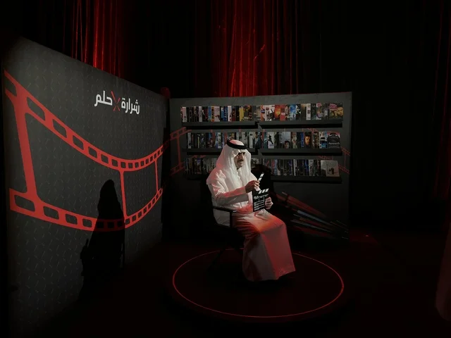 Saudi Man with Clapperboard at TEDx King Fahd University