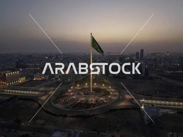 سارية علم المملكة العربية السعودية في جدة وقت الشروق