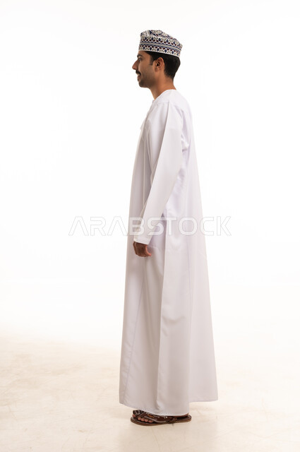 Omani Man in Traditional Dishdasha Profile Studio Shot