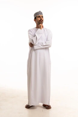 Omani Man in Traditional Dishdasha Thinking Pose