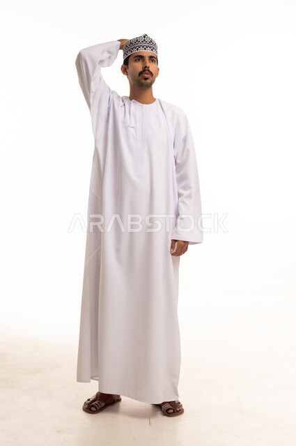 Omani Man in Traditional Dishdasha and Kumma