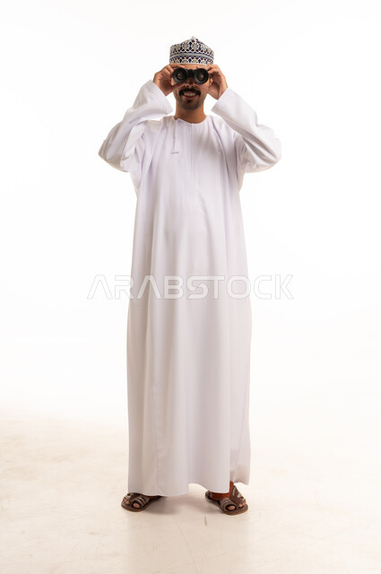 Omani Man with Binoculars in Traditional Dress