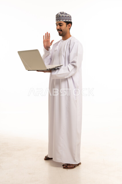 Omani Man with Laptop Waving on Video Call