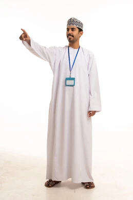 Omani Man in Traditional Dishdasha Pointing on White Background