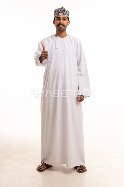 Omani Man in Traditional Dress Giving Thumbs Up