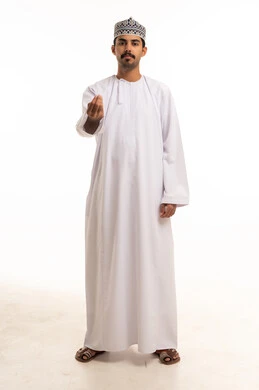 Omani Man in Traditional Dishdasha Making Hand Gesture