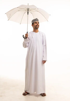 Omani Man with White Umbrella in Traditional Dress