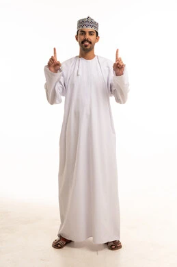 Omani Man Pointing Upwards in Traditional Dress