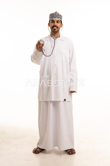 Omani Male Doctor Holding Stethoscope on White Background