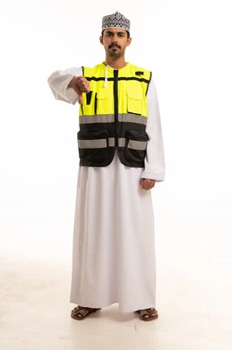 Omani Man in Safety Vest Giving Thumbs Down